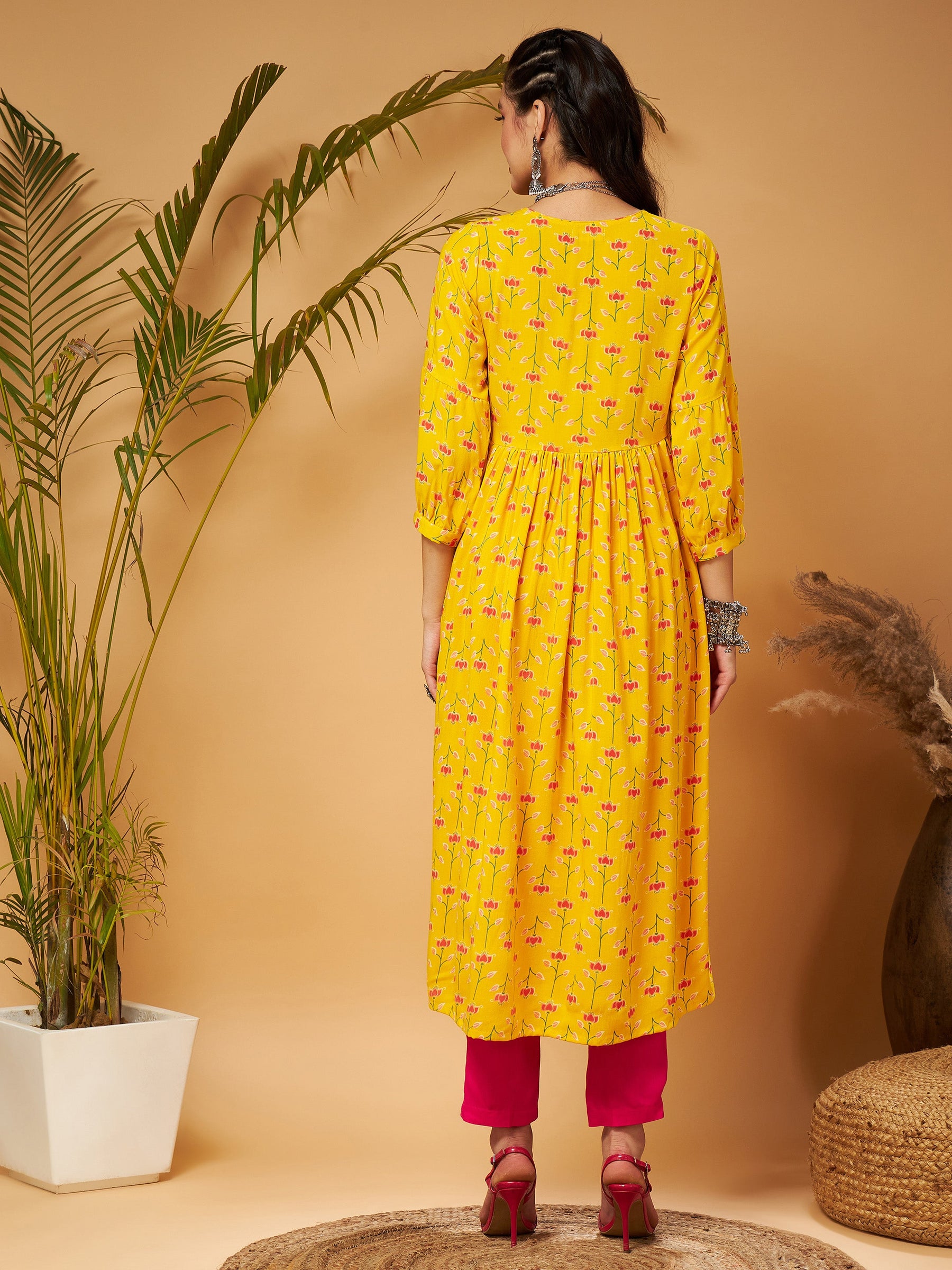 Yellow Floral Bishop Sleeves Tie-Up Kurta-Shae by SASSAFRAS