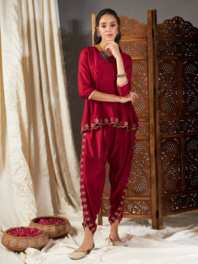 Maroon Zari Embroidered Peplum Top With Dhoti Pants-Shae by SASSAFRAS