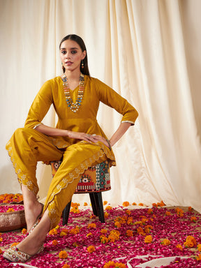 Mustard Zari Embroidered Peplum Top With Dhoti Pants-Shae by SASSAFRAS