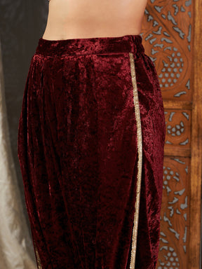 Maroon Velvet Embroidered Peplum Kurta With Dhoti Pants-Shae by SASSAFRAS